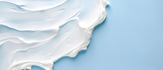 Close up of White Toothpaste Isolated on a Solid Blue Background with Empty Copy Space for Text. Macro Top View of Dental Care Concept Advertisement Commercial Banner, Teeth Hygiene Advertising Cover