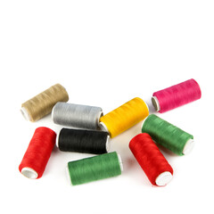 Sewing tools, set of spools of thread isolated on white. Free space for text.