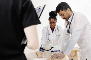 Medical Students Practicing CPR on a Mannequin