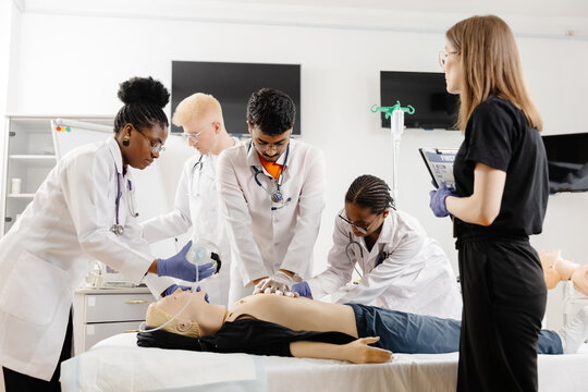 Medical Students Practicing CPR on a Mannequin