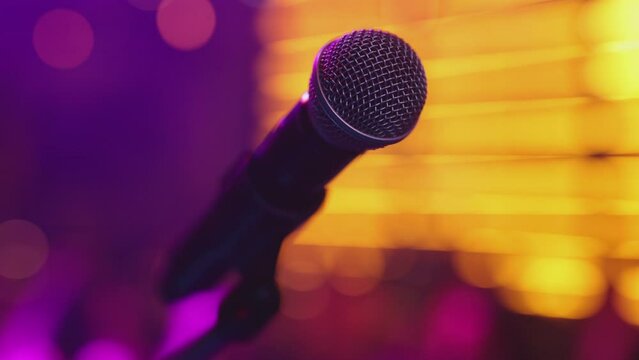 Close-up of microphone in concert hall or stand up club