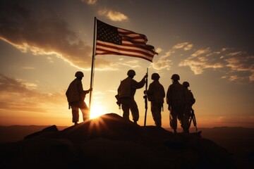 American soldier wearing an authentic World War II uniform stands on a hill in the desert, holding a national flag.