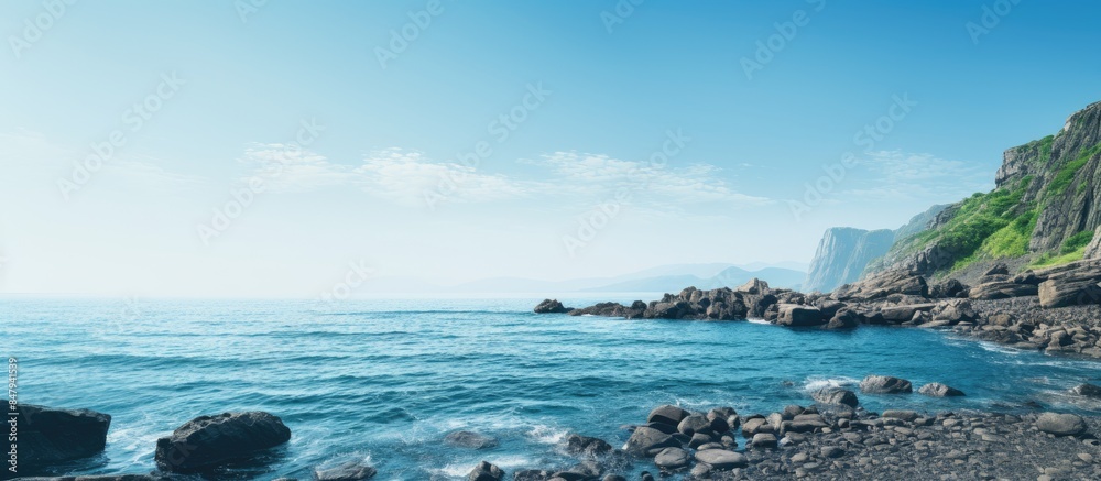 Wall mural Clear sky with sea and rocks. Creative banner. Copyspace image - Wall murals