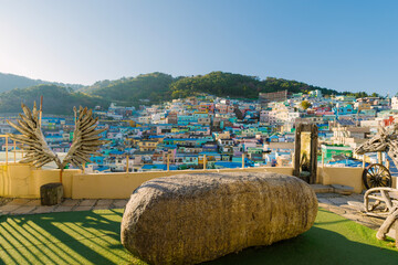  the vibrant and picturesque urban landscape of Gamcheon Culture Village, Busan, Korea, featuring a...