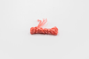 tying straw rope on white background