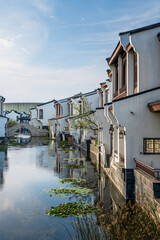 Serene Canal Among Traditional Houses