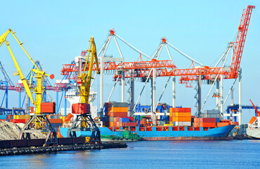 Container ship under port crane
