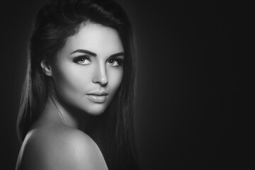 Fototapeta premium Studio Portrait of a Woman with Perfect Skin and Healthy Hair