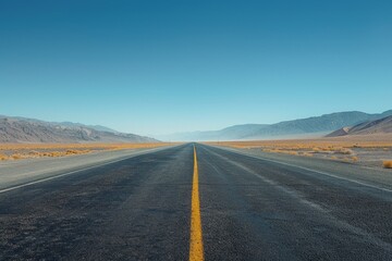 Fototapeta premium Mirage of a Distant Lake on Empty Desert Road - Surreal Documentary Landscape Photography for Editorial Content