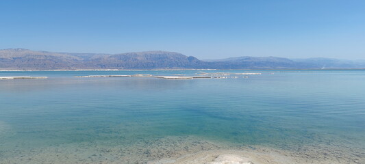 The insanely beautiful Dead Sea resort. March 2024. Reflection of the sky in the sea