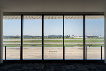 Naklejka premium View of airport runways from the terminal window