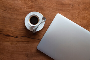 Coffeetime at a distant working desk 