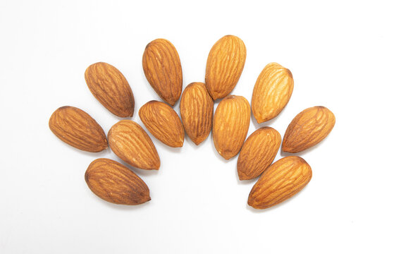 Almond placed pefect on white background