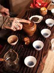 Host preparing a tea ceremony