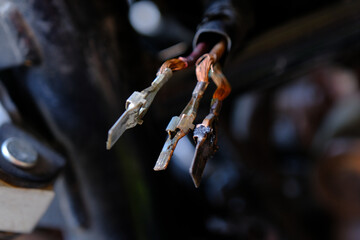 Check the electrical cable plug on the motorcycle.	