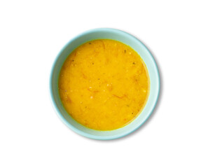 Pumpkin and jerked beef soup in a bowl isolated over white background