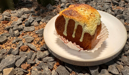 Fusion croissant called Cromboloni invented in New York, Round puff pastry filled with cream, and glazed with white, milk chocolate or pistachio. Crunchy and soft in the same time, good recipes 