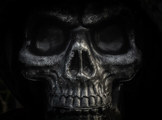 Happy Halloween day concept. Close-up scary evil skull mask, angel of death with big eyes and...