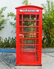 view of a red wooden telephone box
