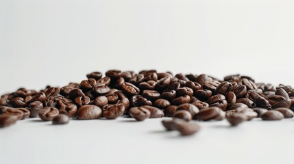 Naklejka premium Coffee Beans on a white surface