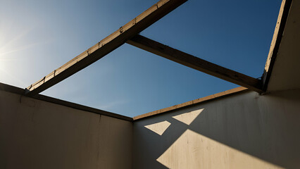 towering building stretches towards a clear blue sky, blending architecture with nature's vastness.