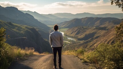 Fototapeta premium The back of a man at two roads deciding for best chance of environment protection, 