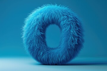 A single furry letter 'O' sits on a bright blue background, providing a fun and whimsical design element