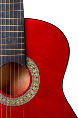 Close-up. A part of a red acoustic guitar on white background