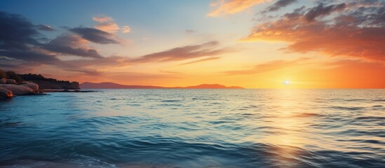 Obraz premium View of sunset over the sea selective focus. Creative banner. Copyspace image