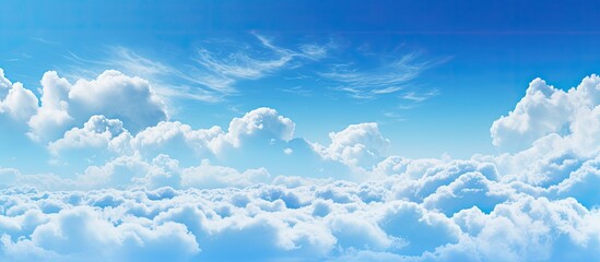 Background of blue sky with white art clouds. Creative banner. Copyspace image