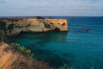 Stunning seascape with cliffs and rocks at Torre Sant'Andrea, Salento, Italy