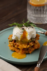 Sweet potato waffles with avocado and poached egg