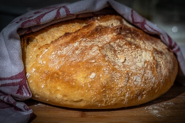 freshly baked loaf of bread from the oven, home recipe for tasty bread