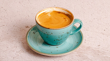 Espresso in blue cup isolated
