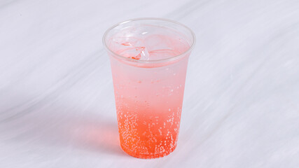 Iced mango lemonade glass isolated