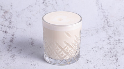 Milk glass isolated on table