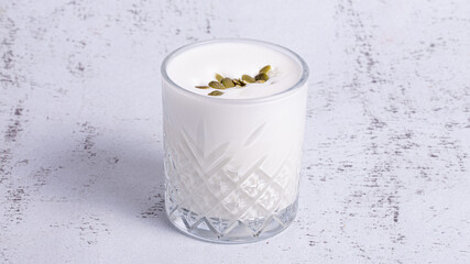Milk glass isolated on table