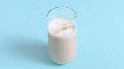 Cacao drink glass isolated on blue