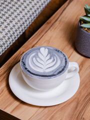 Blue coffee cup on table