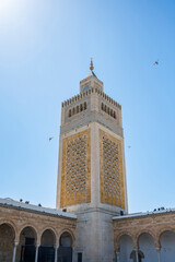 Obraz premium Zitouna Mosque,Located in the heart of Tunis' medina, this important mosque was founded in 734 and built on a site once occupied by a church. It was totally rebuilt in the 9th century and restored 