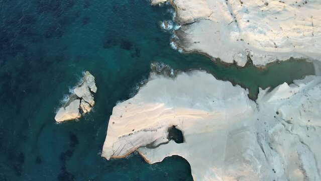Sarakiniko cliffs on a sunny summer day on the island of Milos, Cyclades, Greece
