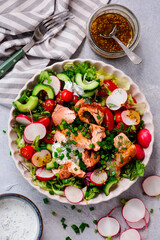 Pulled salmon spring  vegetables salad. .top veiw.selective focus