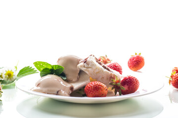 fresh organic cottage cheese with strawberries and ice cream in a plate