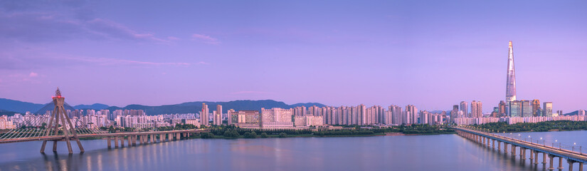 Scenic Sunset Panorama view at Jamsil Railway Bridge over the Han River (Hangang). Wonderful cityscape. (May 26 2024)