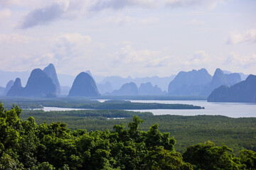 View to Phang Nga Bay in Thailand from the point of Samet Nangshe. Picturesque landscape with rock islands on sea coast