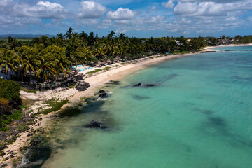 Belle Mare Beauty: Drone shot of Mauritius Pristine Beach, Clear Sea, and Resorts - Photo of Relaxation and Tropical Getaways
