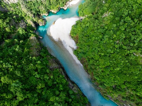 Birds eye view of Shala River canyon and the clear blue waters in northern Albania. 