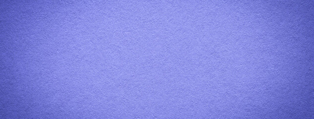 Texture of vintage very peri paper gradient background with dark vignette. Structure craft navy blue cardboard