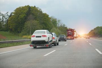 Towing Truck With A Damaged Vehicle After Car Accident Collision.