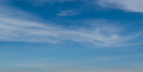 Soft blue sky with white cloud, natural background